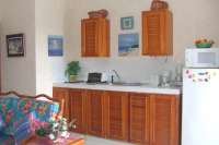 Spacious Kitchen Area with Dishes/Pans, etc.