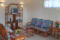 Roomy Comfortable Living Area in Tropical Decor!
