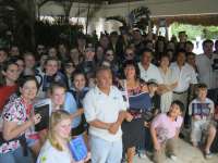 Wesley Choir with Church Pastors Receiving Bibles