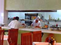 Our Chefs Hard at Work Preparing Your Meal!